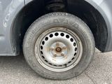 a close up of a flat tire on a car