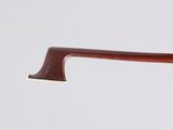a close up of a wooden handle on a wooden stick