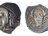 une image représentant une pièce d'argent sur laquelle figure le portrait d'une femme