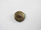 a close up of a button with a horse on it