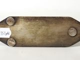 a close up of a metal object with a tag on it