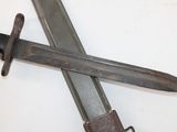 a knife that is laying on top of a table