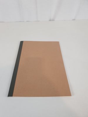 an image of a piece of brown paper sitting on top of a white table
