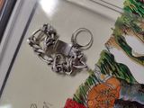 a picture of a keychain and a picture of a tiger