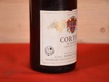 a bottle of wine that is sitting on a table