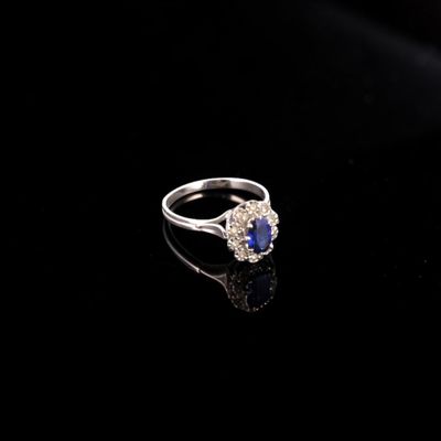 Bague marguerite en or gris 18k (750e), ornée d'un saphir sy… - Photo 1