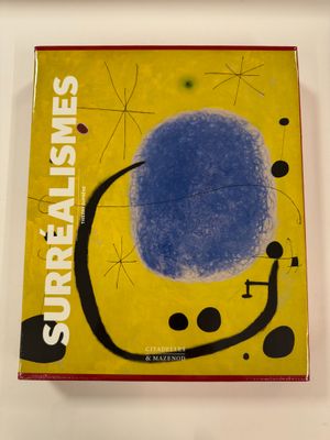 an image of a book with a blue circle on it