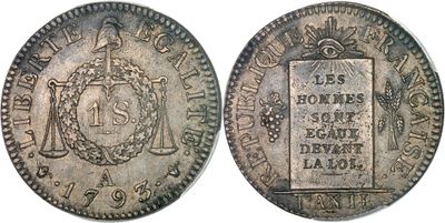 a silver coin with a picture of a man on it