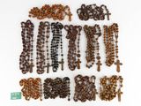 a lot of beads that are on a white surface