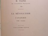 an old book with french writing on it sitting on a table