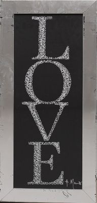 a picture of a picture of the word love written on a chalkboard