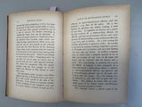 an open book that is sitting on a table