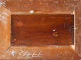 a picture of a wooden frame with writing on it