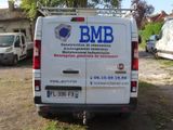 a van that is parked on the side of the road