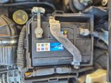 a close up of a car ' s engine and its components