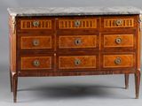 a marble top chest of drawers on a stand