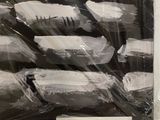 a picture of a bunch of doughnuts wrapped in plastic