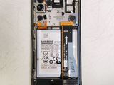a picture of a cell phone with a battery attached to it