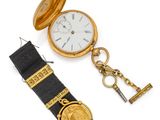 an image of a gold pocket watch and a watch chain