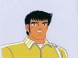 un dessin d'animation représentant un homme aux cheveux noirs et portant une veste jaune