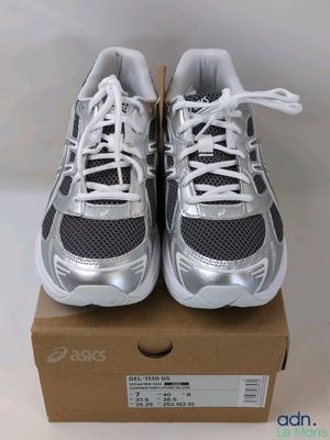 a close up of a pair of sneakers on a box