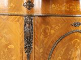 a cabinet that has been decorated with flowers and leaves