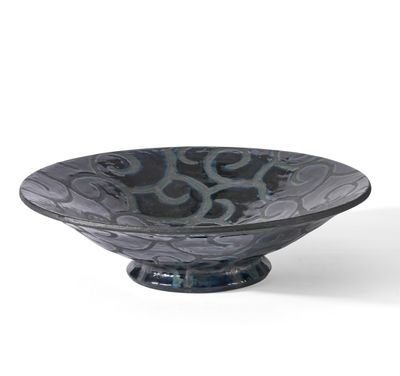an image of a black and blue glass bowl on a white background