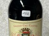 a bottle of wine that is sitting on a table
