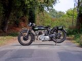 a motorcycle that is parked on the side of the road