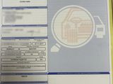 a picture of a document with a picture of a house on it