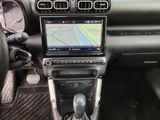a car dashboard with a gps device in it