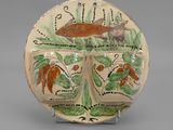 an image of a decorative plate with a fish on it