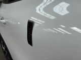 a close up of a car with a sticker on it