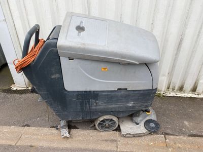 a machine that is sitting on the side of the street
