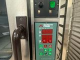 an image of a commercial oven with the door open