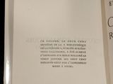 someone is holding a book open to a page with a quote on it