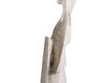 statue of a woman holding a book in her right hand