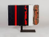 an image of a book sitting on top of a metal stand