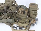 a lot of belts that are sitting on the ground