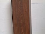 an image of a wooden speaker on a stand