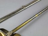 two different types of fishing rods on the table