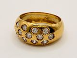 an image of a gold ring with diamonds on a white surface