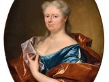 an oval portrait of a woman in a blue dress holding a piece of paper