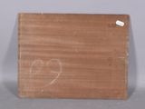 a picture of a picture of a heart drawn on a piece of wood