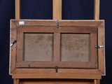 a picture of a wooden easel with a painting on it