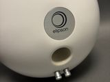 a close up of a white object on a table