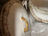 two bowls and a saucer in a box