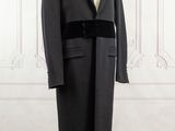 the coat is black and has a black belt on it