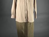 an image of a mannequin dressed in khaki clothing