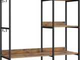 a wooden and metal bookcase with four shelves
